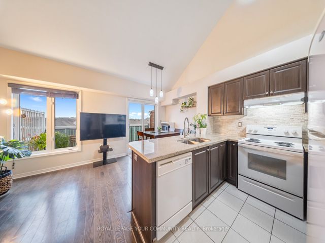48 - 651F Warden Ave