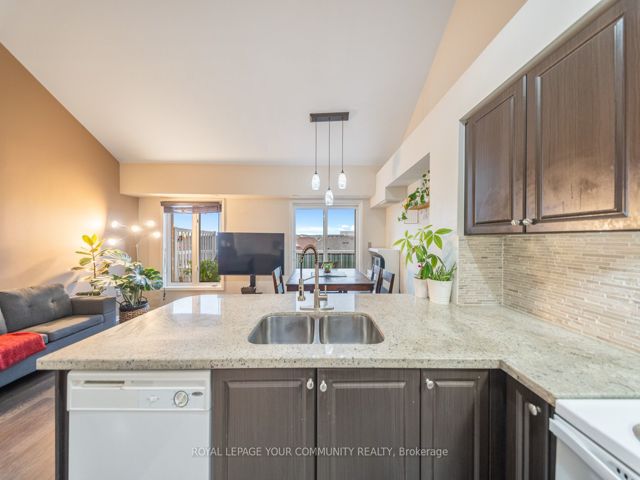 48 - 651F Warden Ave