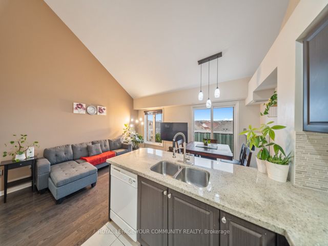 48 - 651F Warden Ave