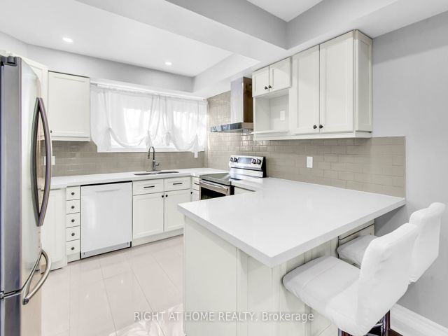 13 - 2716 St Clair Ave E