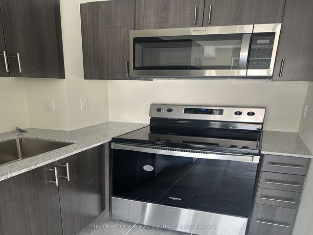 11 - 245 McLevin Ave