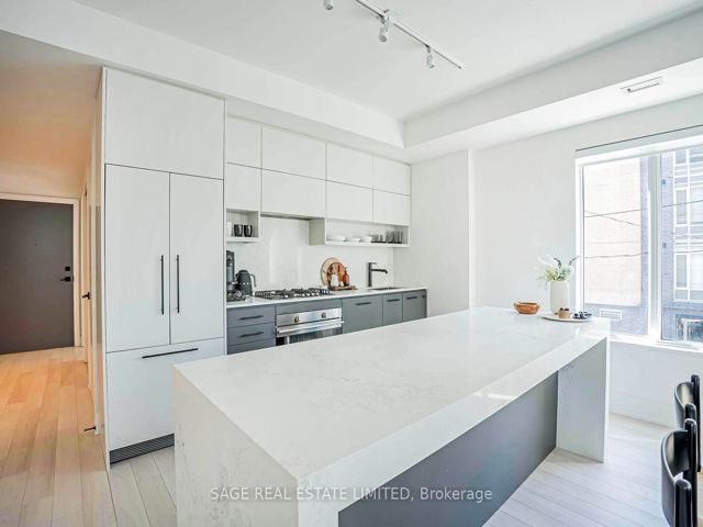 206 - 1888 Queen St E
