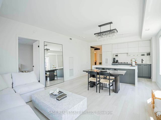 206 - 1888 Queen St E