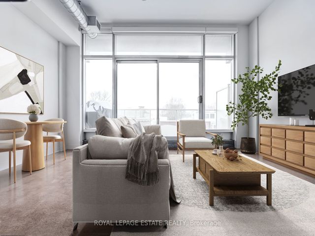 403 - 747 Queen St E