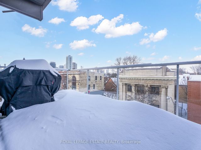 403 - 747 Queen St E