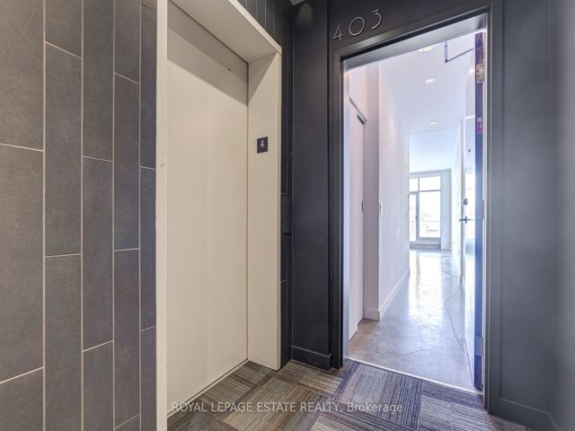 403 - 747 Queen St E