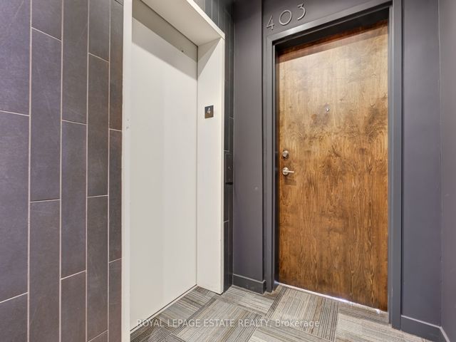 403 - 747 Queen St E