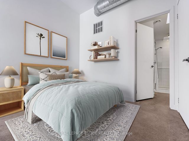 403 - 747 Queen St E