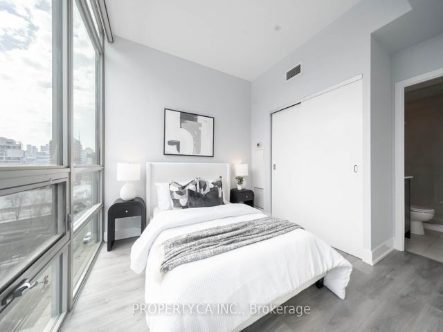 810 - 630 Queen St E