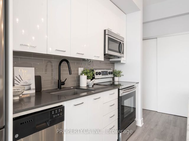 810 - 630 Queen St E