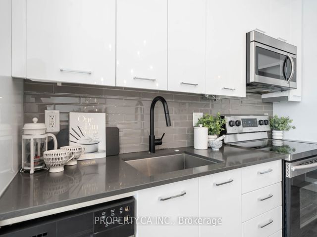 810 - 630 Queen St E