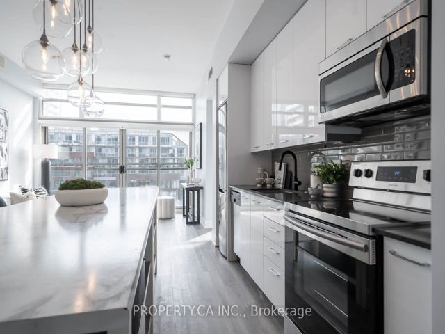 810 - 630 Queen St E