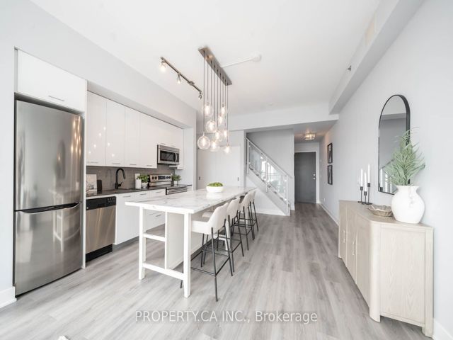 810 - 630 Queen St E