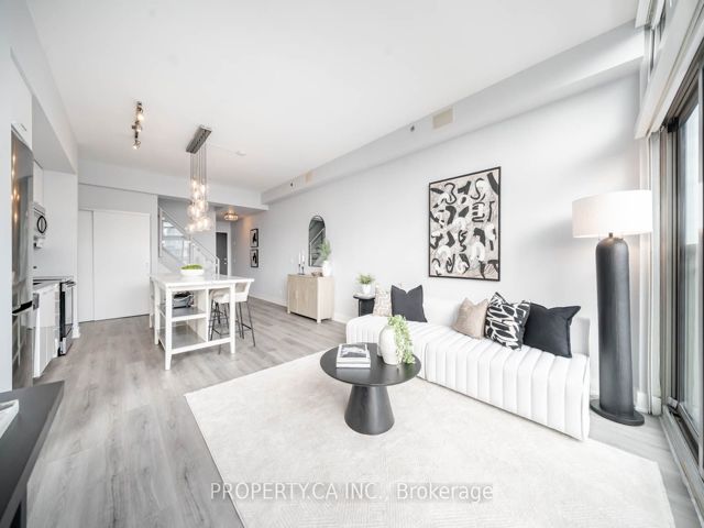 810 - 630 Queen St E