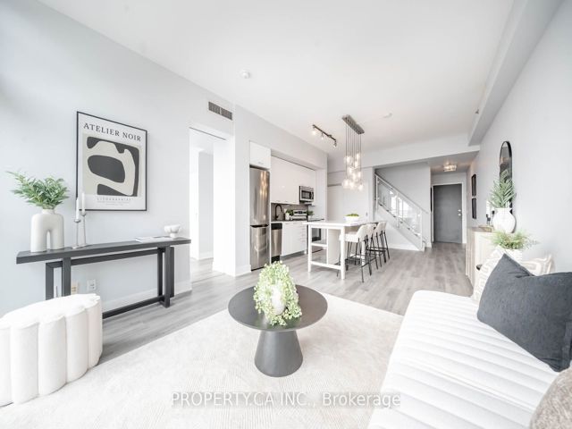810 - 630 Queen St E