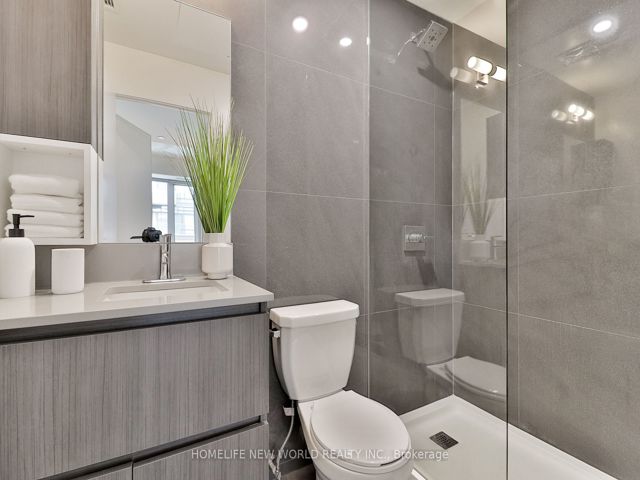 407 - 665 Queen St E