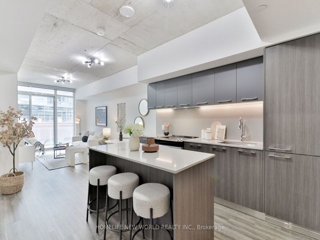 407 - 665 Queen St E