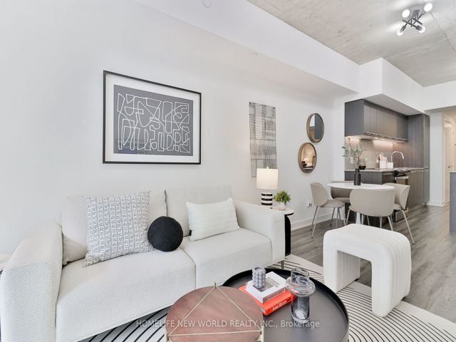 407 - 665 Queen St E