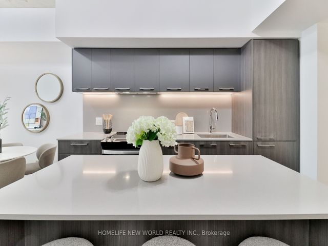 407 - 665 Queen St E