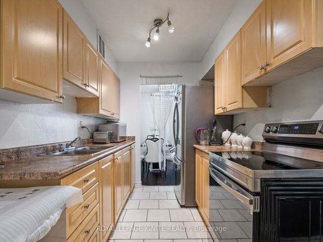 201 - 180 Markham Rd
