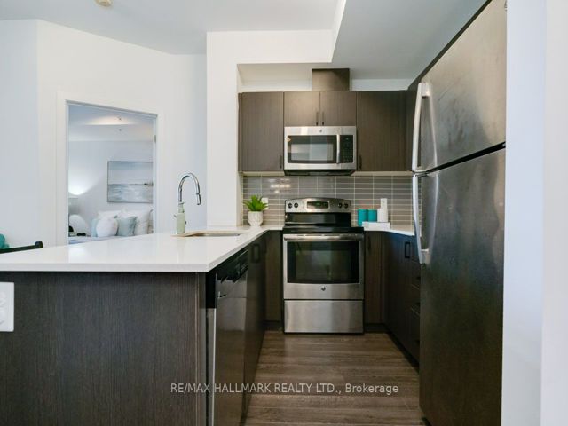 205 - 3560 St. Clair Ave E