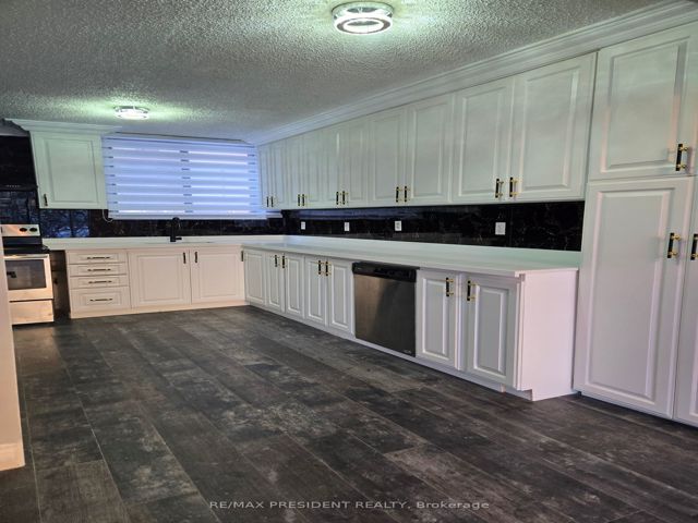 103 - 665 Kennedy Rd