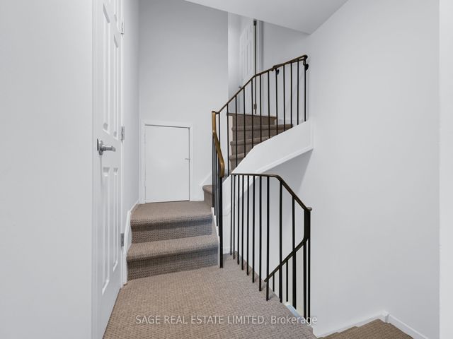38 - 1209 Queen St E