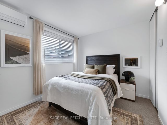 38 - 1209 Queen St E
