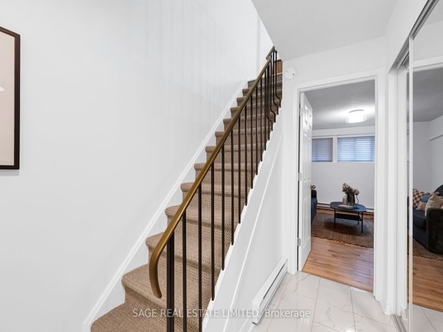 38 - 1209 Queen St E