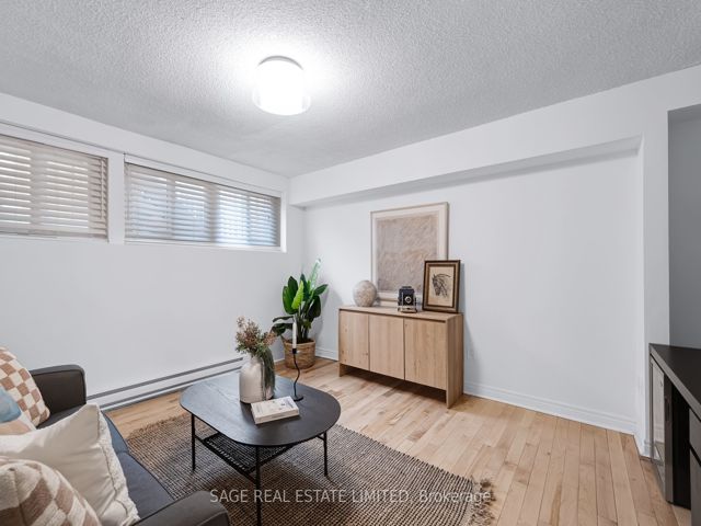 38 - 1209 Queen St E