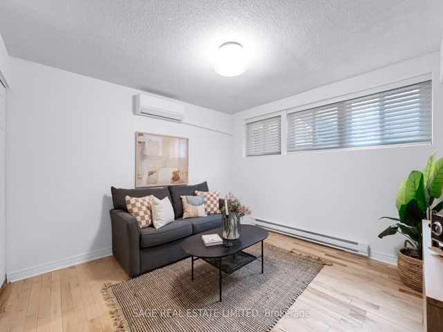 38 - 1209 Queen St E