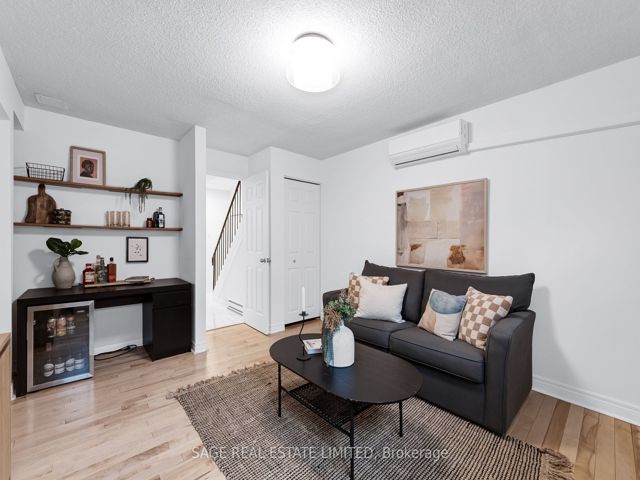 38 - 1209 Queen St E