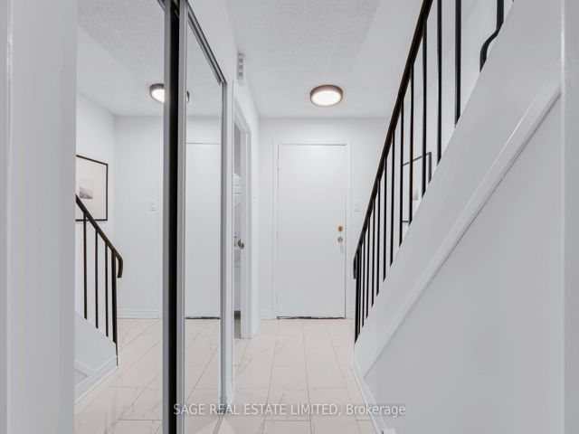38 - 1209 Queen St E