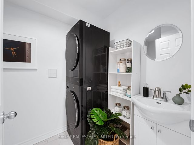 38 - 1209 Queen St E