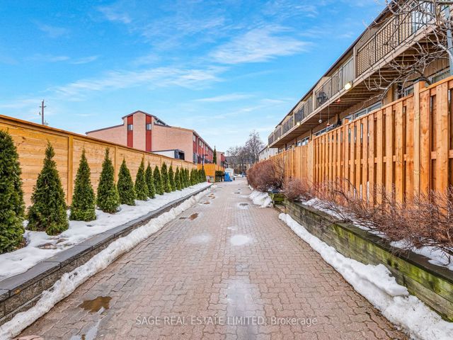 38 - 1209 Queen St E