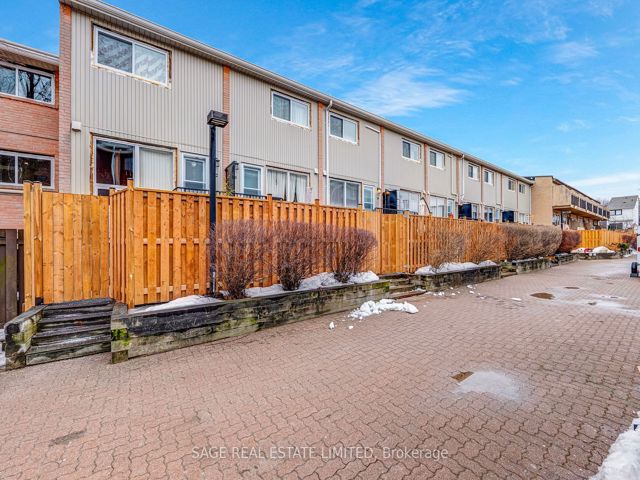 38 - 1209 Queen St E