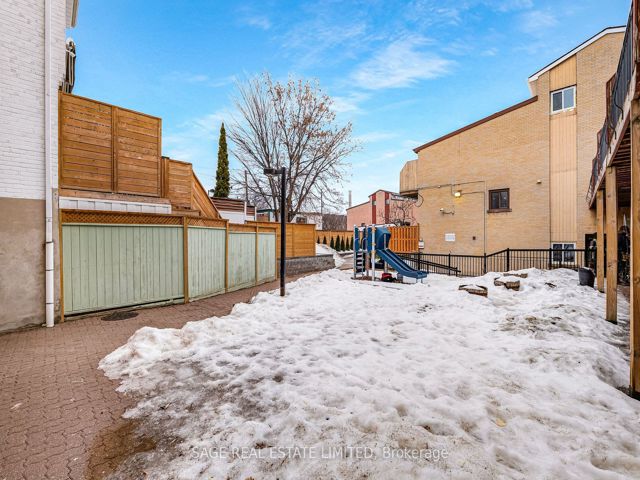 38 - 1209 Queen St E
