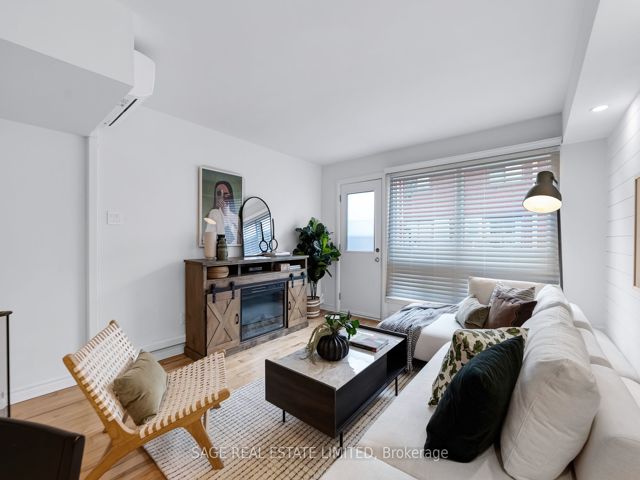 38 - 1209 Queen St E
