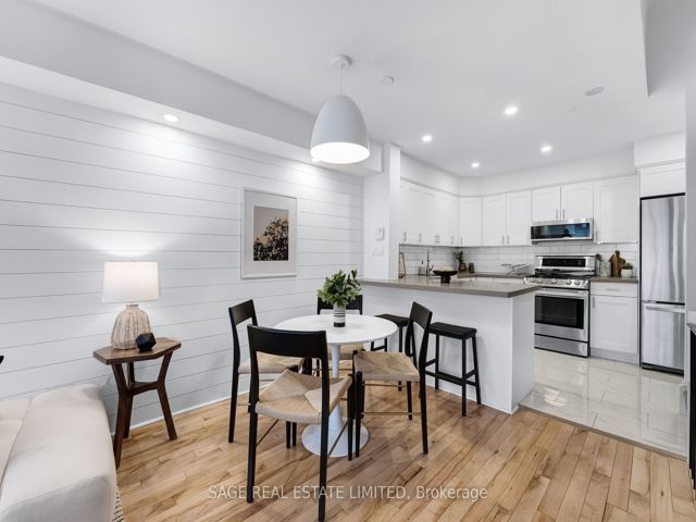 38 - 1209 Queen St E