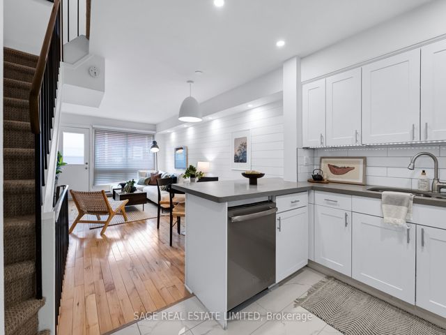38 - 1209 Queen St E