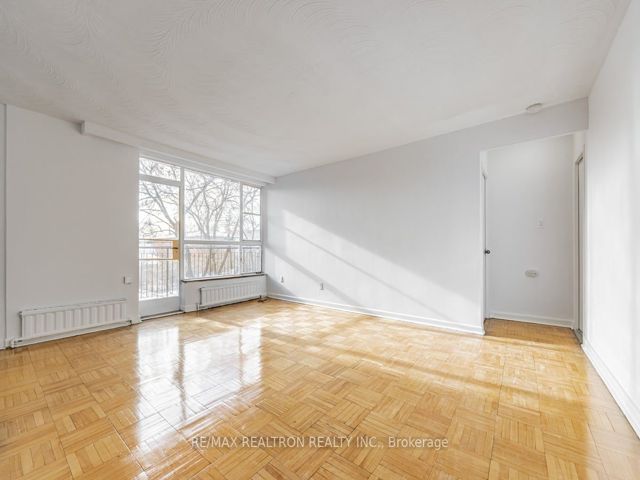 215 - 165 Cosburn Ave
