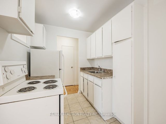 215 - 165 Cosburn Ave