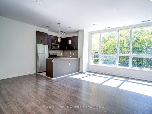 102 - 840 Queens Plate Dr