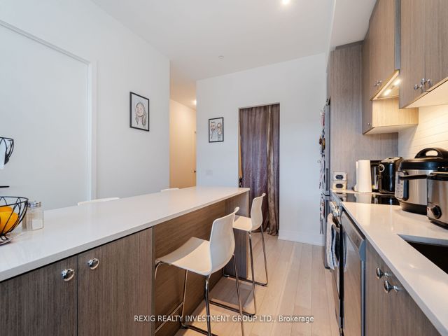 301 - 50 George Butchart Dr