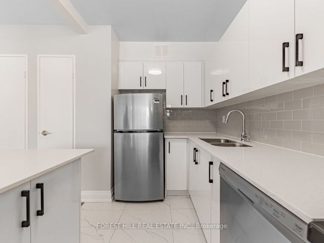 203 - 145 Marlee Ave
