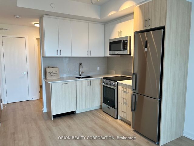 302 - 1195 The Queensway  W