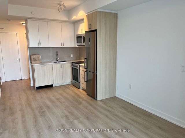 302 - 1195 The Queensway  W