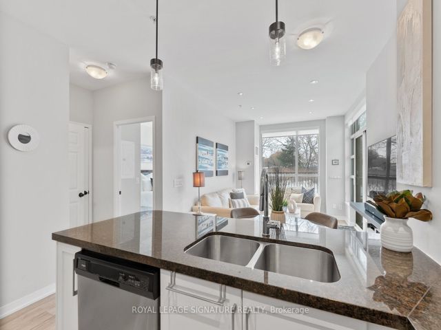 104 - 840 Queens Plate Dr