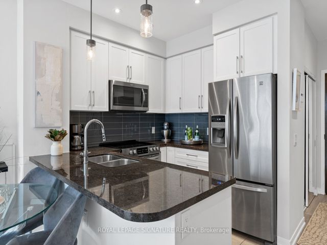 104 - 840 Queens Plate Dr