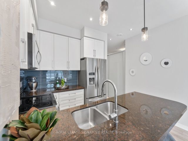 104 - 840 Queens Plate Dr